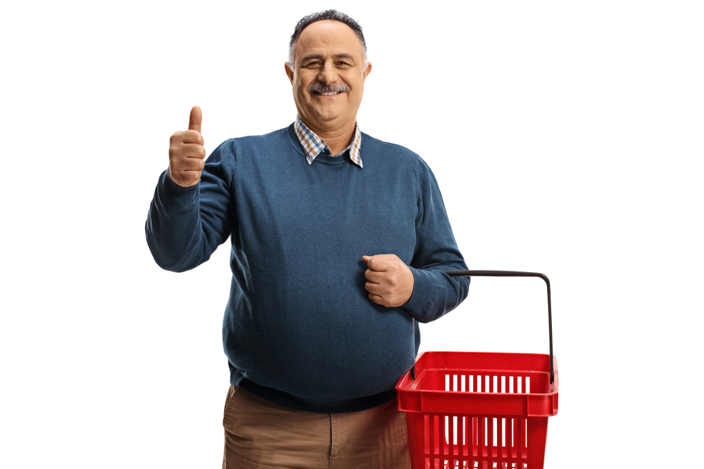 smiling man with a shopping basket