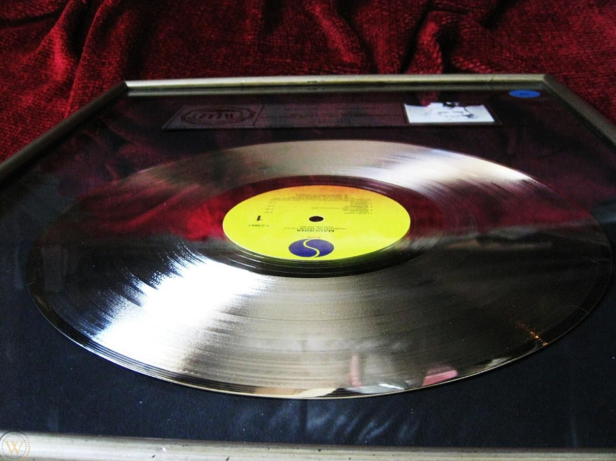 Vinyl record with turntable