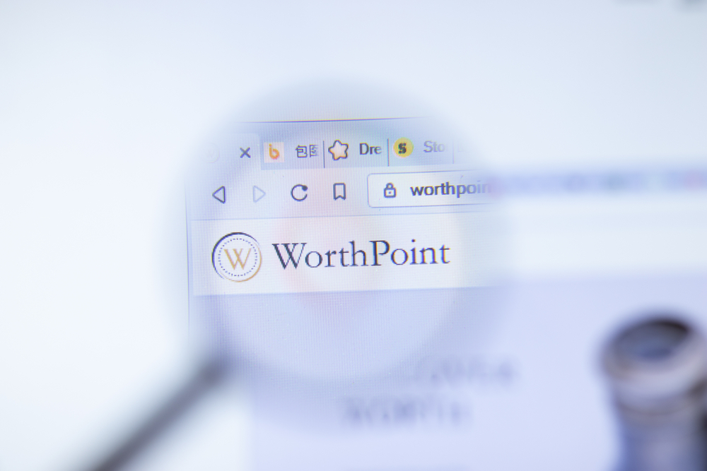 WorthPoint logo with magnifying glass