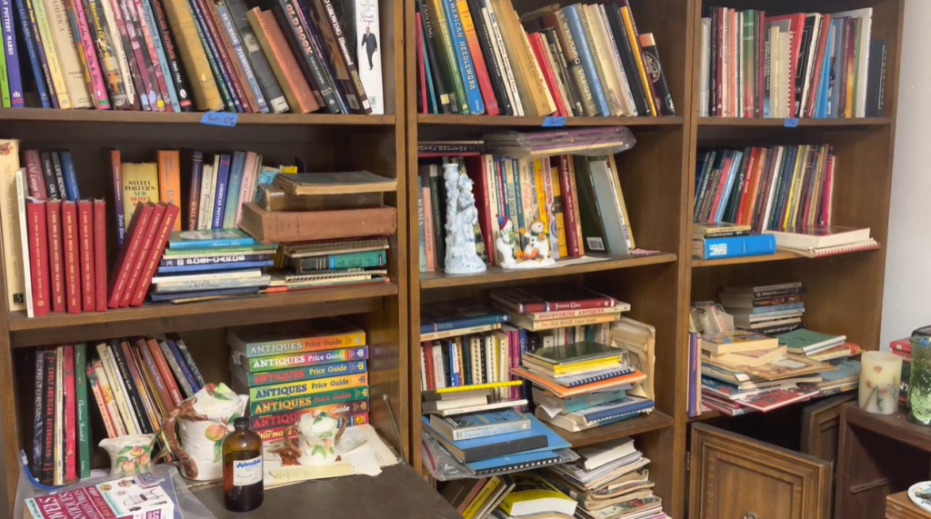 collection of books on shelves catalogs